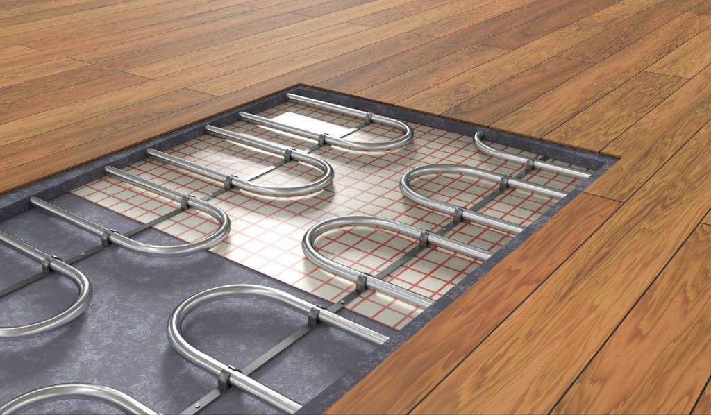 Radiant heating system installed on wooden floor