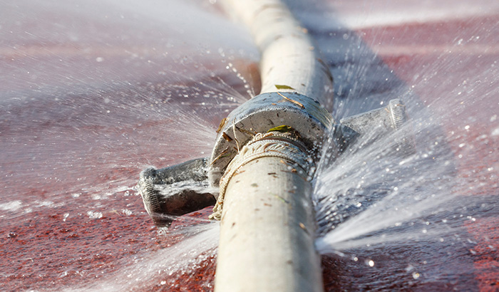 Water Gushing From Burst Pipes In Plumbing System